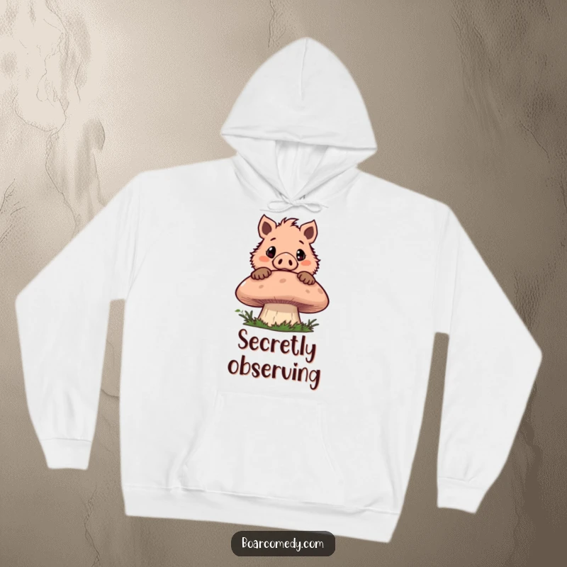 Funny hoodie with a mischievous boar character peeking over a giant mushroom with wide, engaging eyes, perfect for cozy, curious moments.