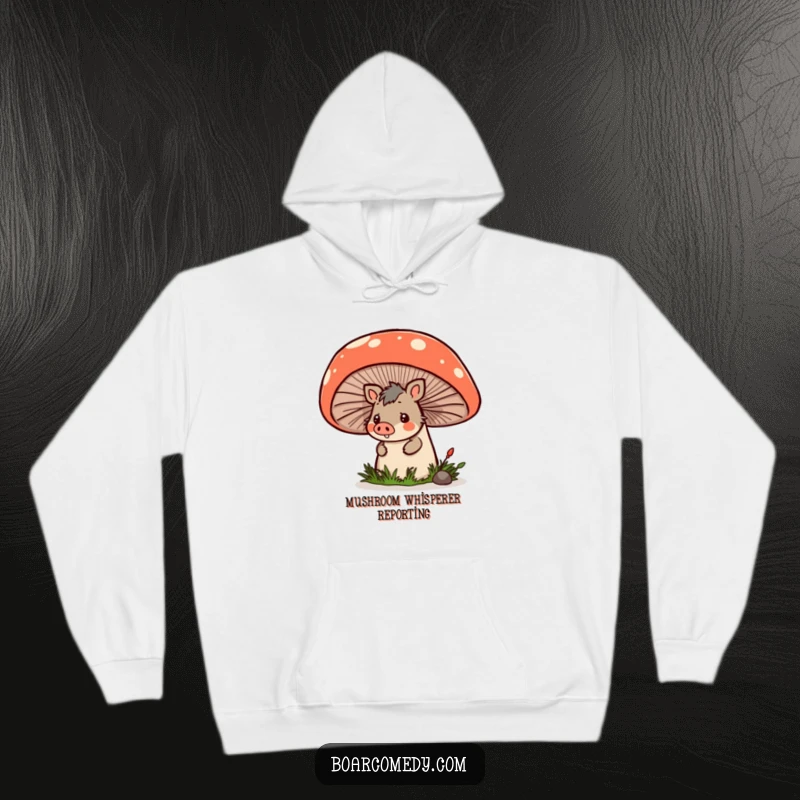 Funny cozy hoodie with a kawaii boar peeking from behind a whimsical giant mushroom, offering warmth and charm.