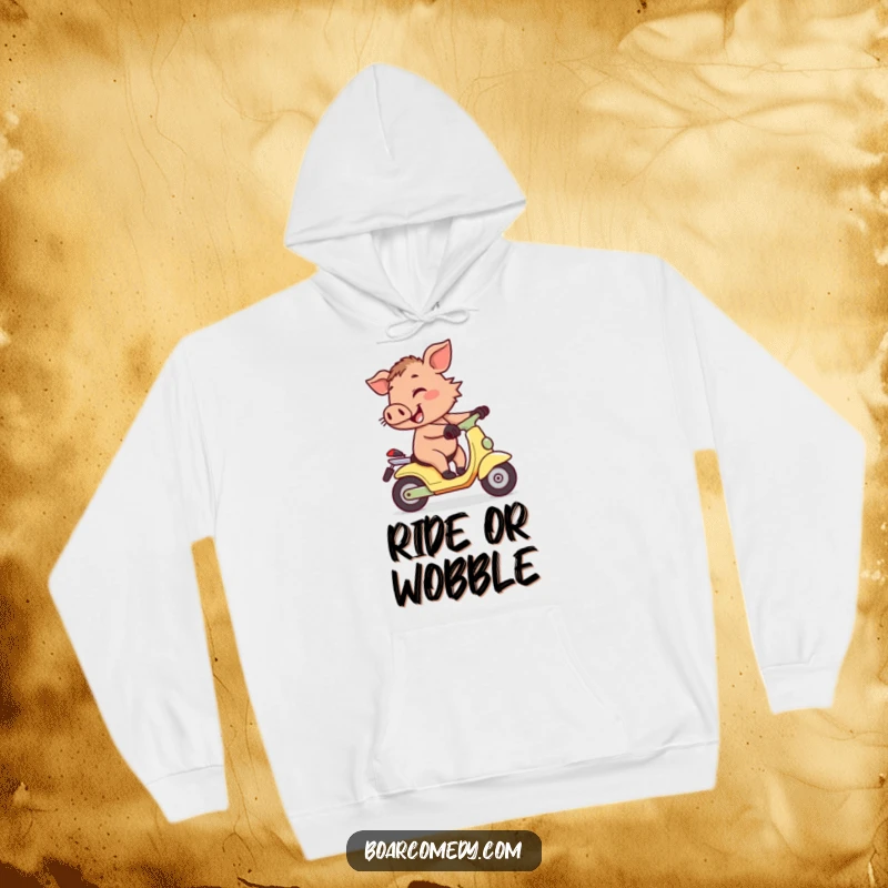 Funny cheerful little boar character wobbling precariously while attempting to ride a tiny scooter, printed on a soft and warm hoodie.