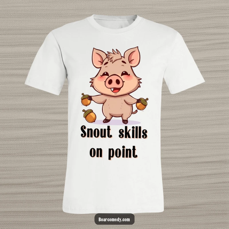 Funny t-shirt showing a smiling boar character mid-juggle with three acorns using its snout, a delightful and humorous woodland scene.