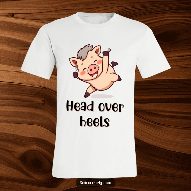 Funny smiling boar character tumbling head over heels in a playful manner, printed on a t-shirt.