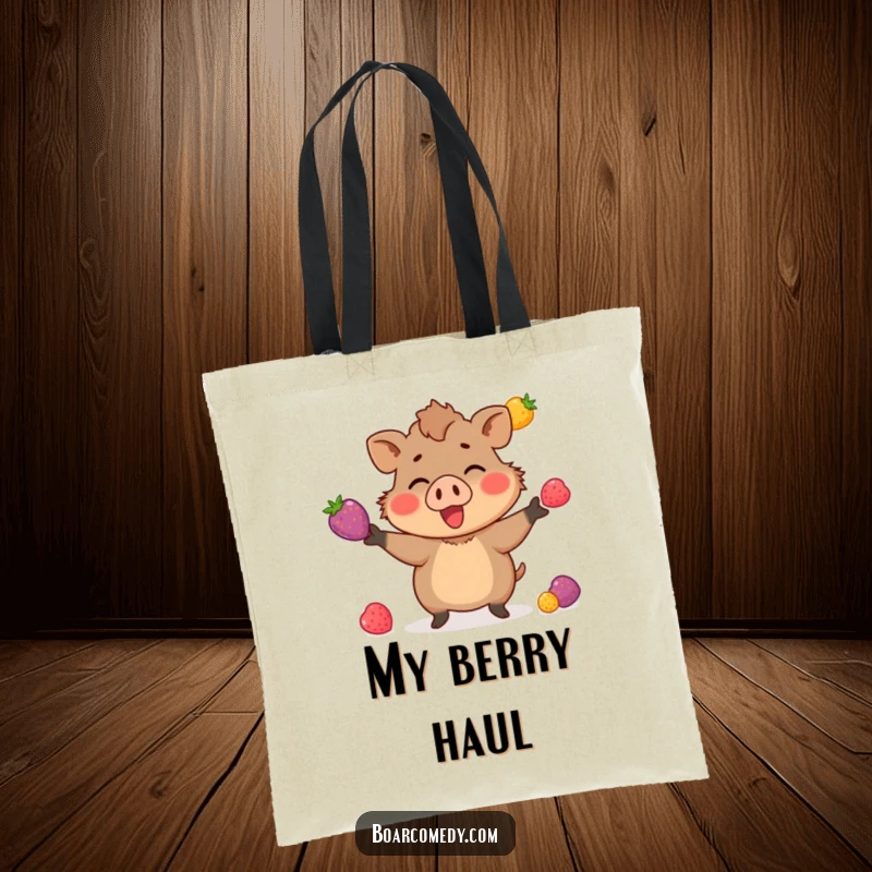 Funny tote bag with a little boar character enthusiastically juggling three brightly colored berries, showcasing a fun and skillful design.